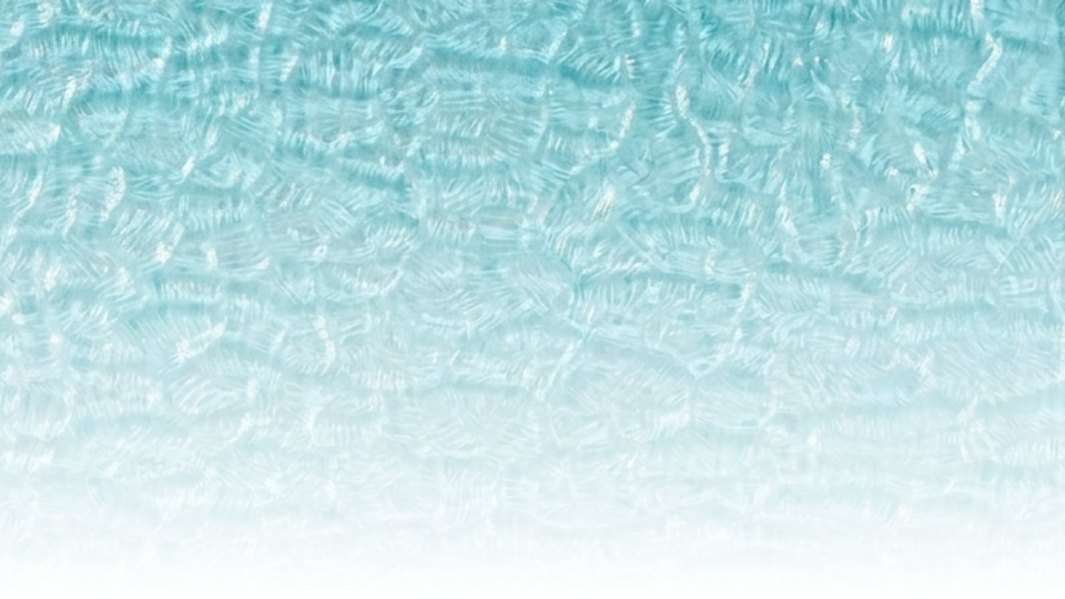 Vancevaで水色に作ったカラーガラスと波模様のパターンガラスを合わせて海を表現したデザインガラス